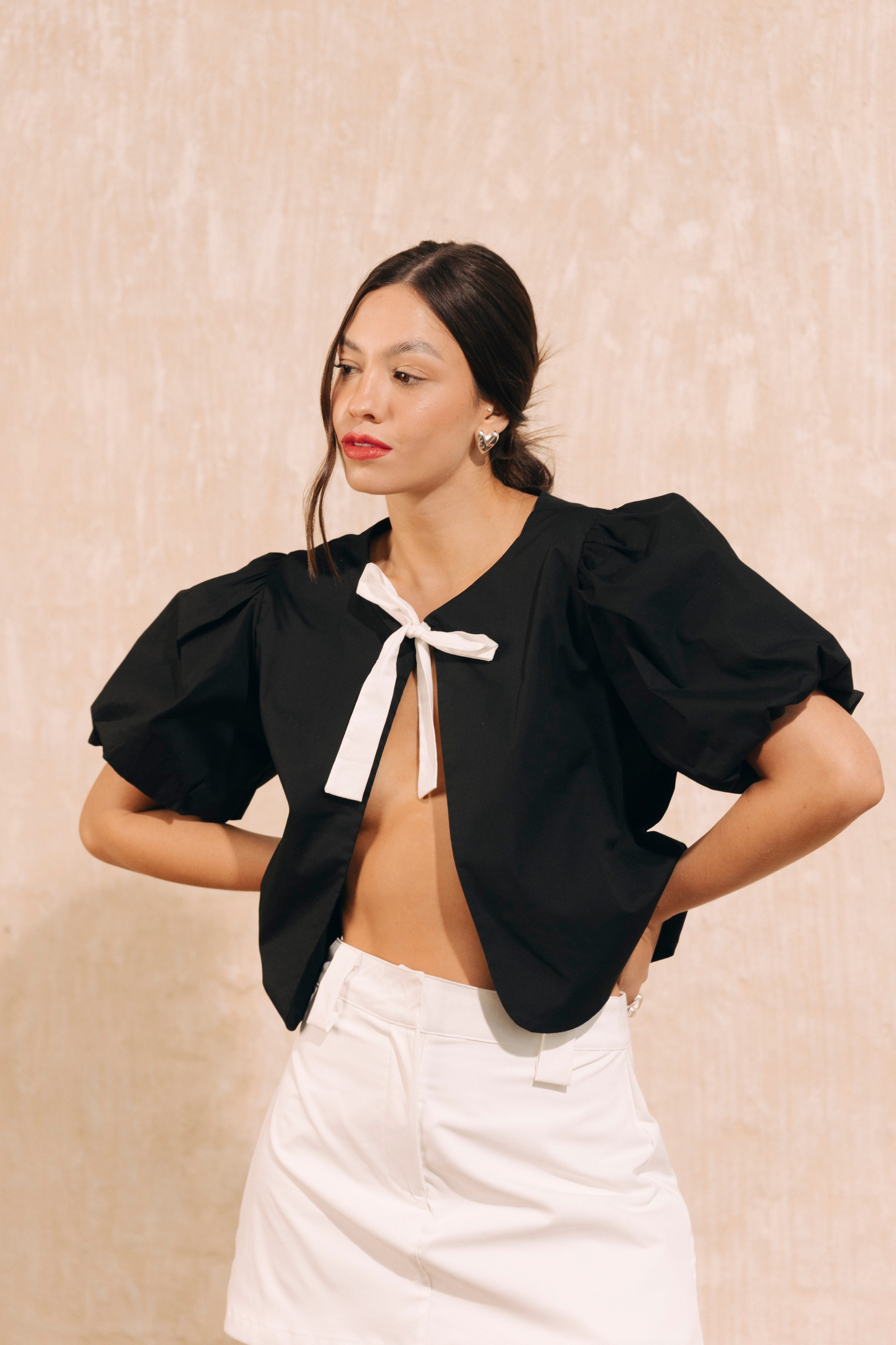 Chaleco lazo con mangas bombachas Luz