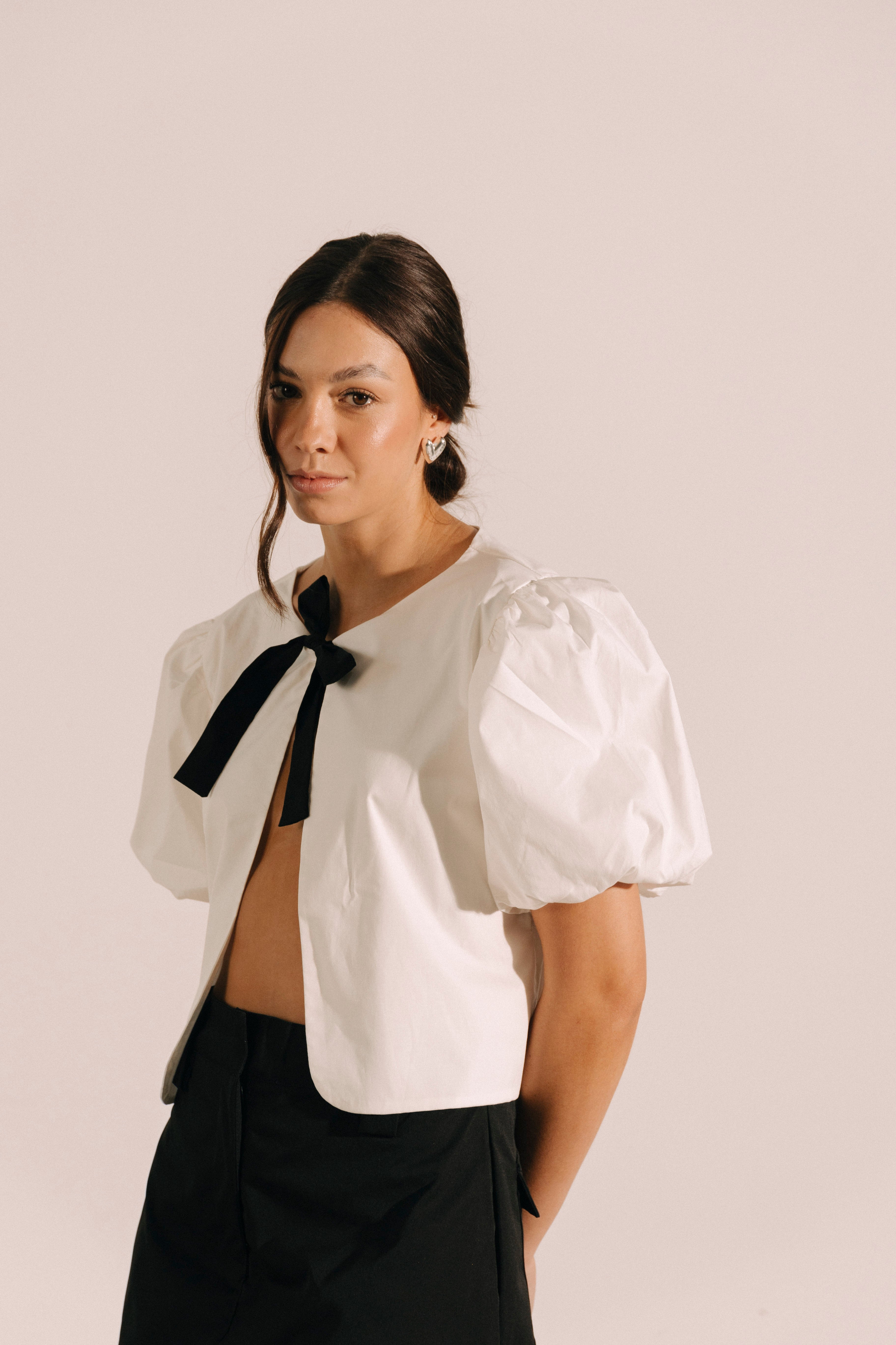 Chaleco lazo con mangas bombachas Luz