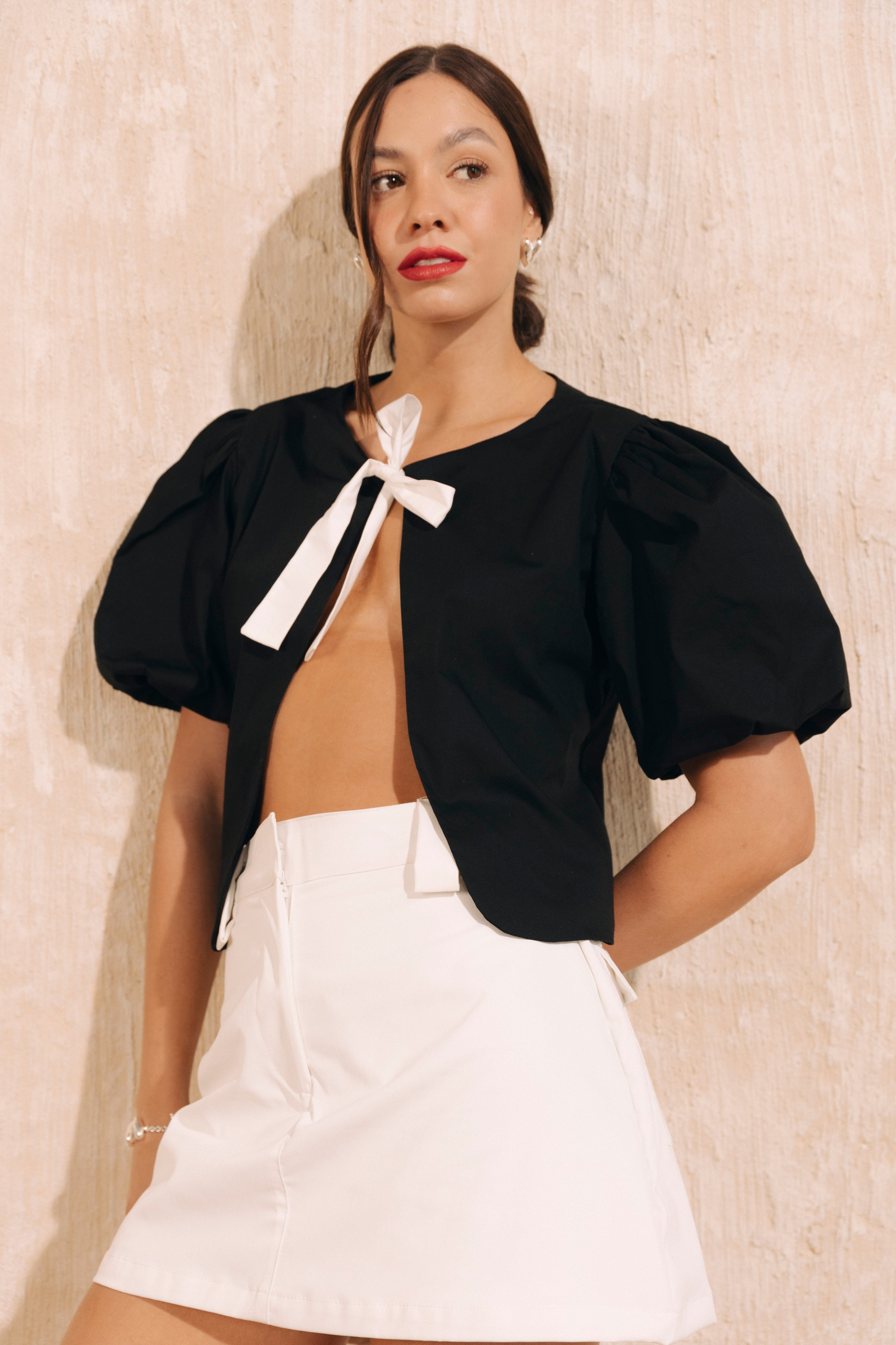 Chaleco lazo con mangas bombachas Luz