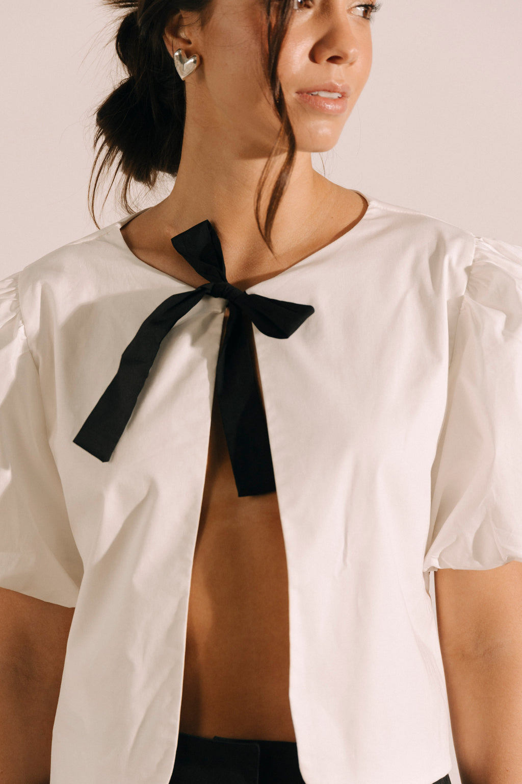 Chaleco lazo con mangas bombachas Luz