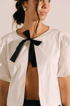Chaleco lazo con mangas bombachas Luz
