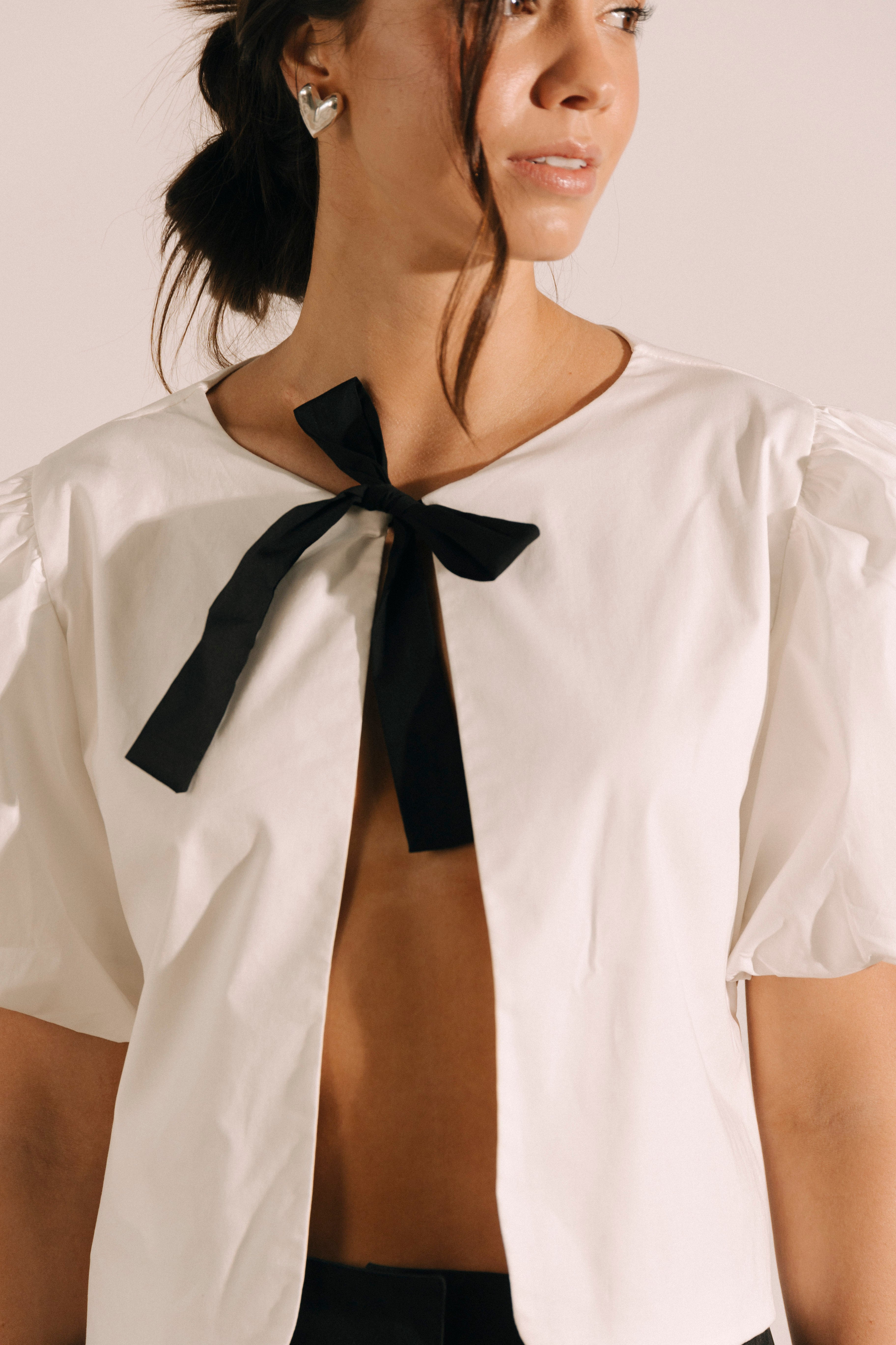 Chaleco lazo con mangas bombachas Luz